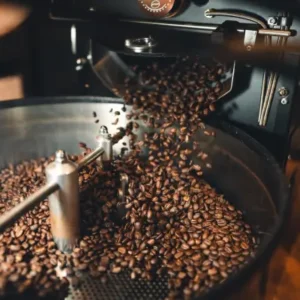 Freshly roasted coffee beans in cooling drum